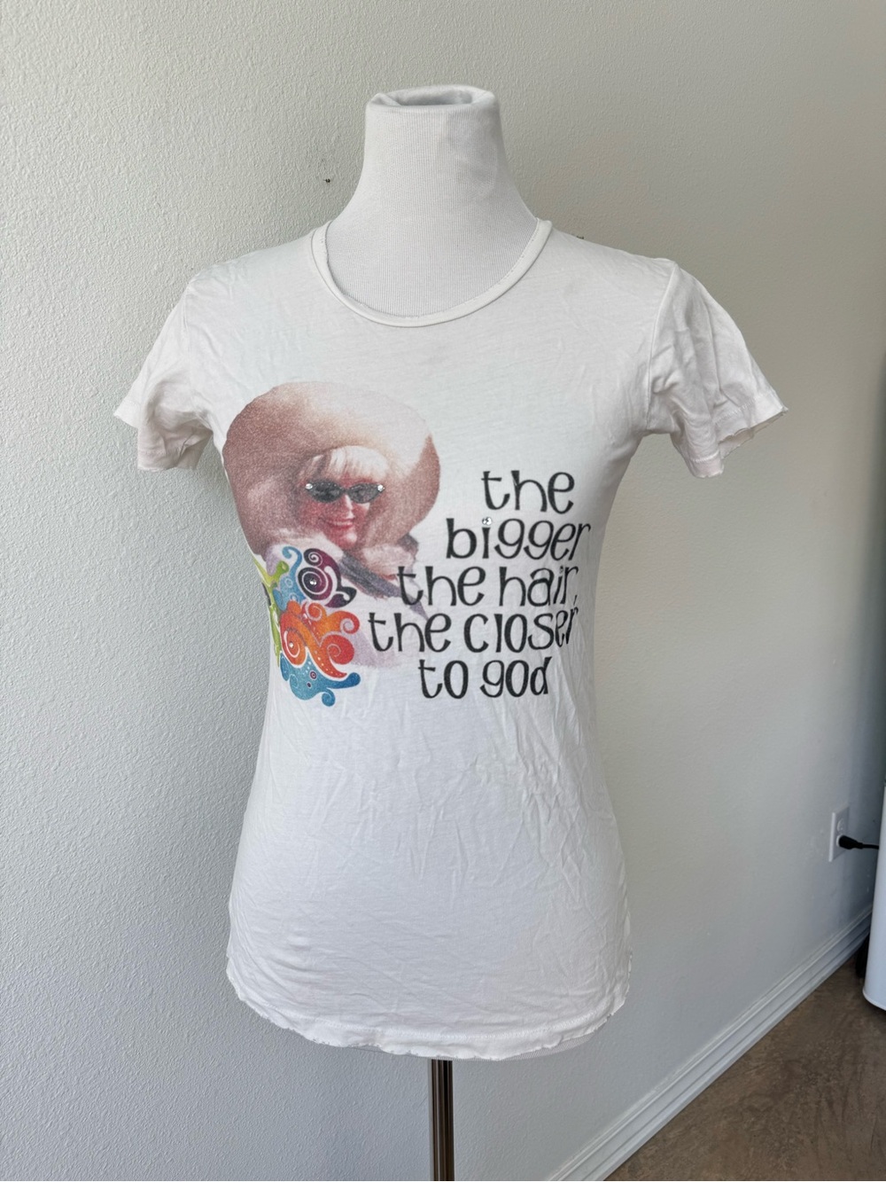 Women’s Funny White Graphic Tee — 'The Bigger The Hair The Closer To God”